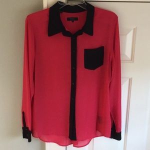 Guess persimmon blouse with black details.